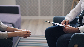 Woman speaking to her therapist